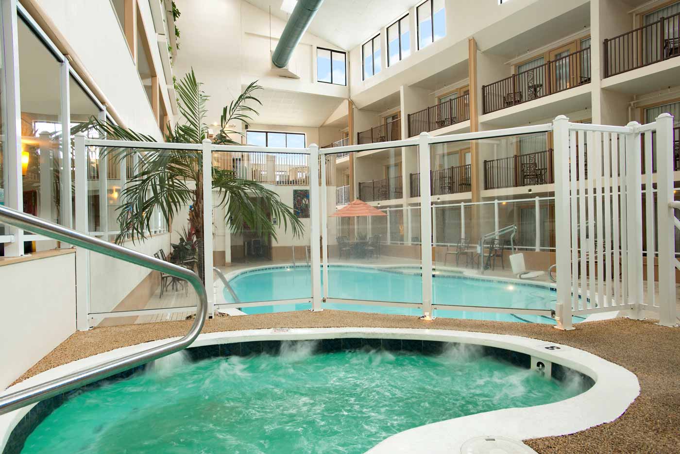 indoor atrium pool with jacuzzi hottub